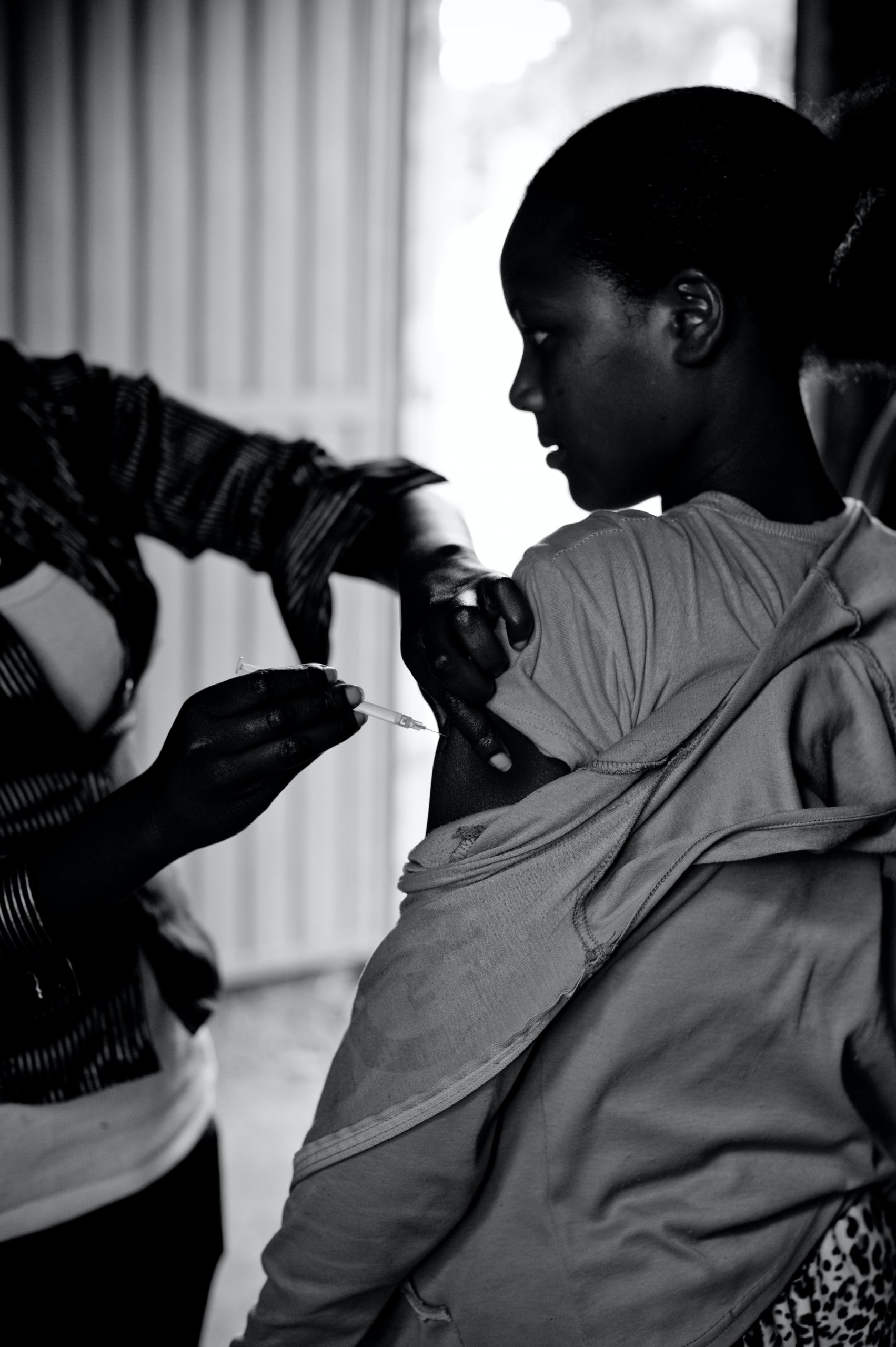 African girl gets vaccine, Ethiopia