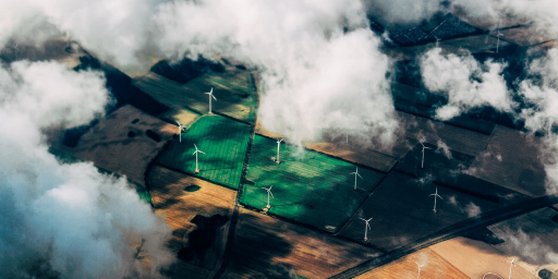 Wind turbines fields clouds