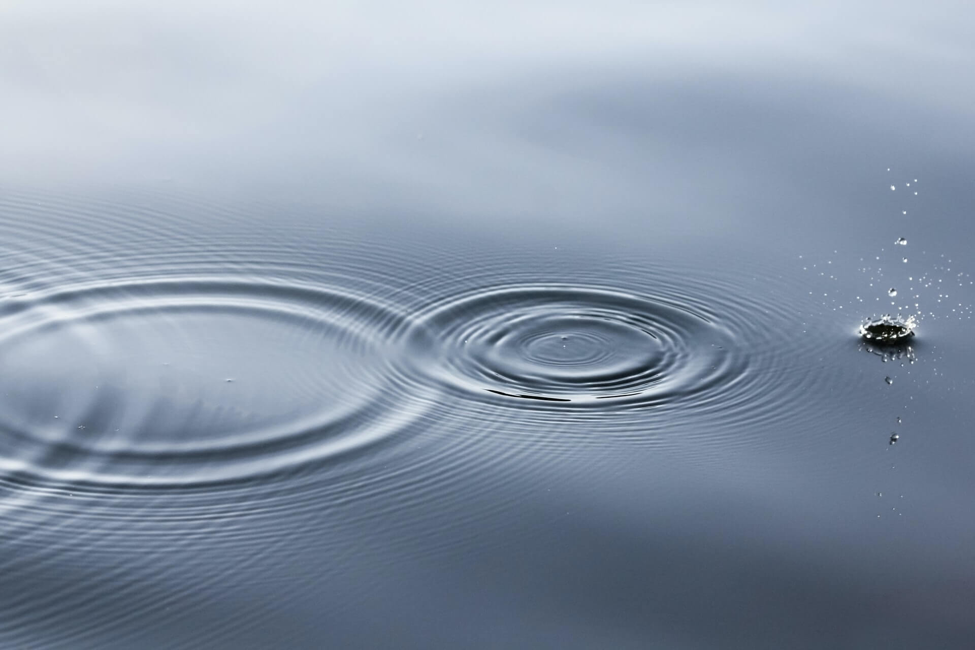 water drops forming patterns on the surface