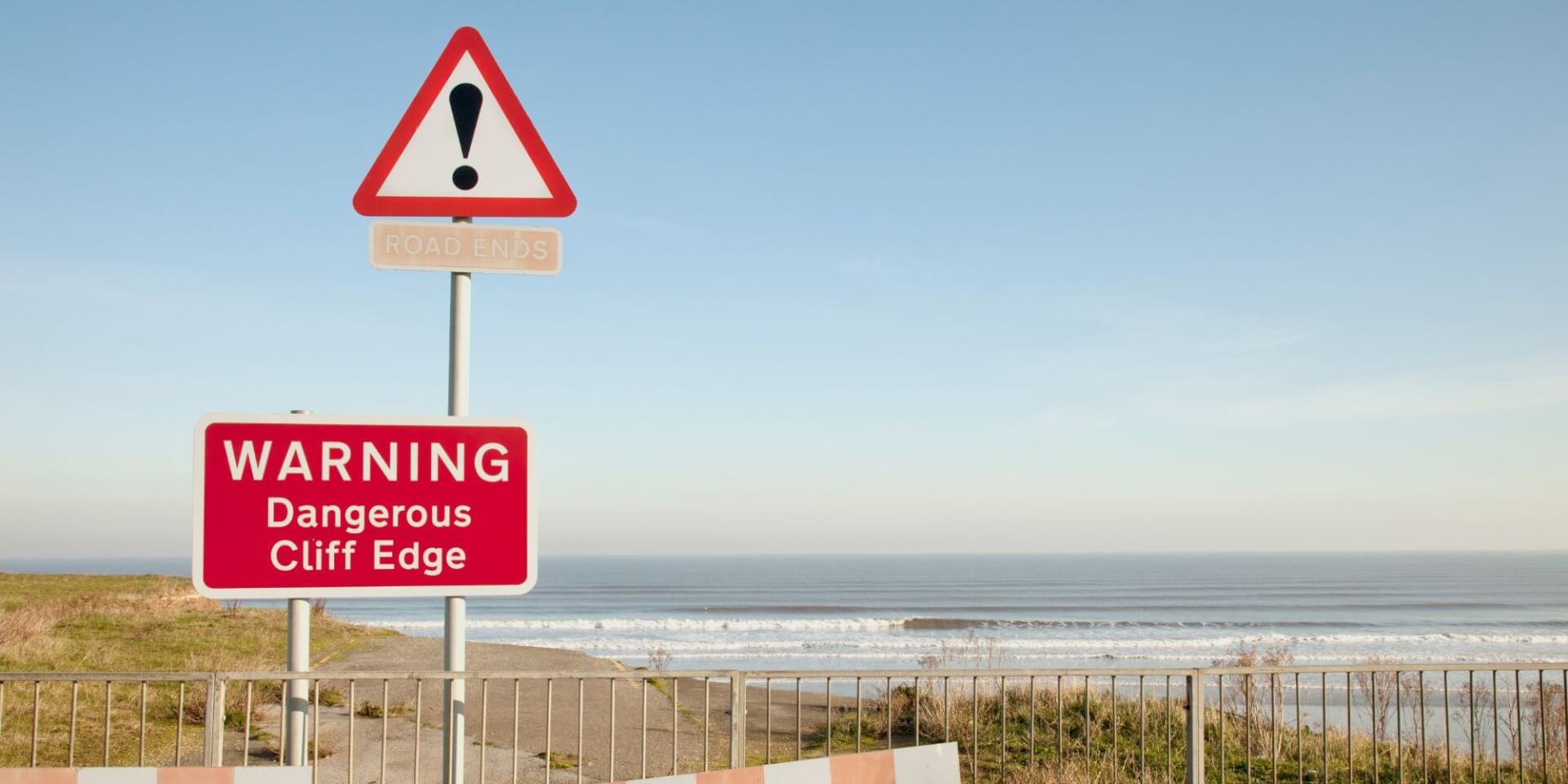 Warning sign on a coast
