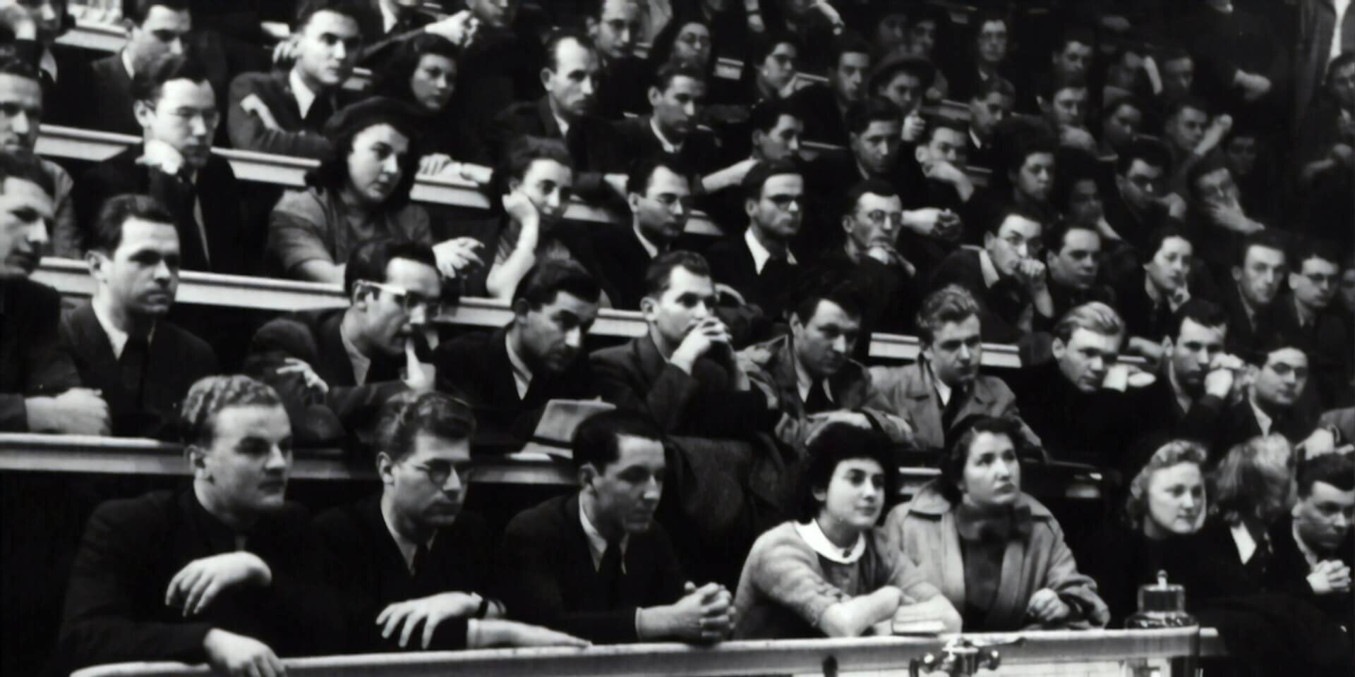 A black and white photo showing students at a lecture by Prof. Leopold Schönbauer in 1948
