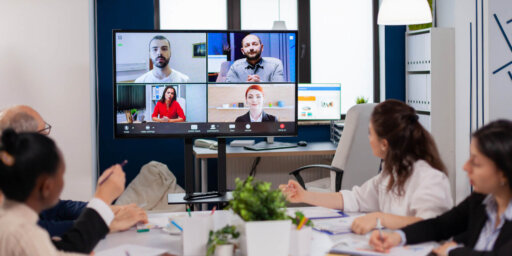A team of colleagues working by video call