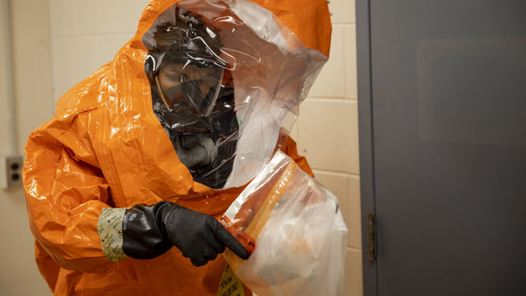 A person in a hazmat suit