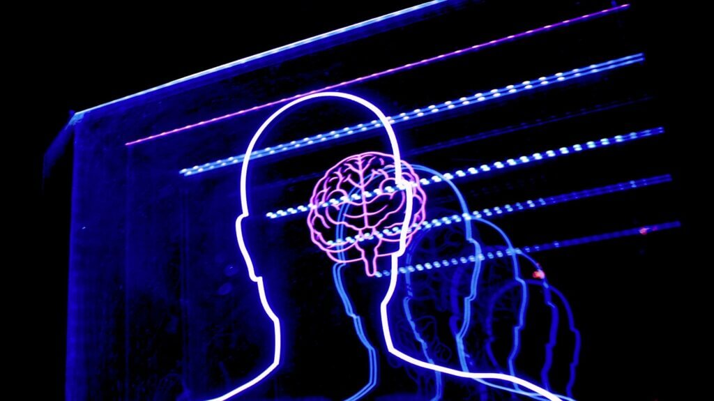 neona zīme, kurā attēlots cilvēka siluets