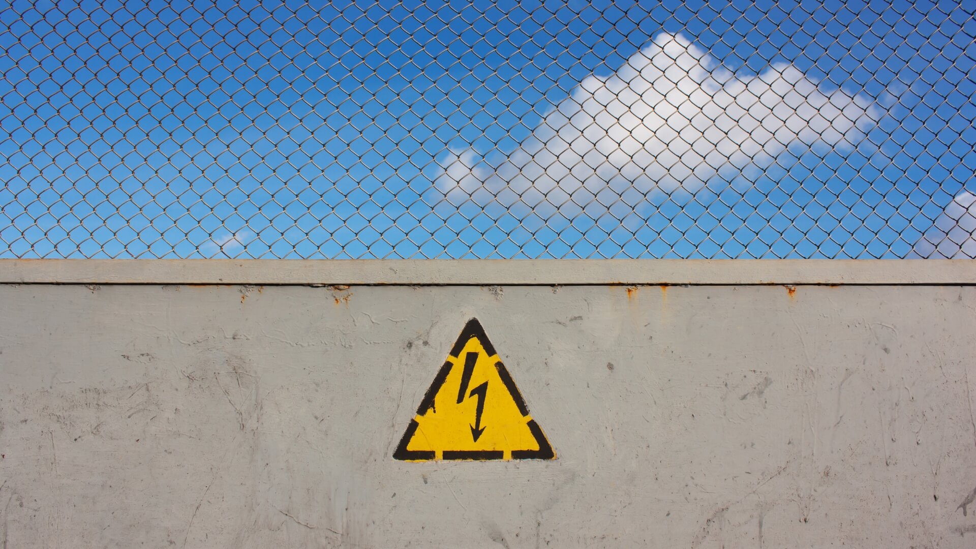 High Voltage Warning on a Fence