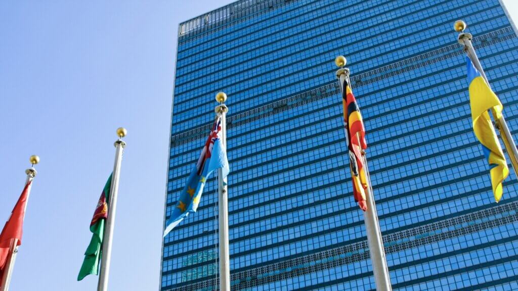 flags in front of the UN office in NY