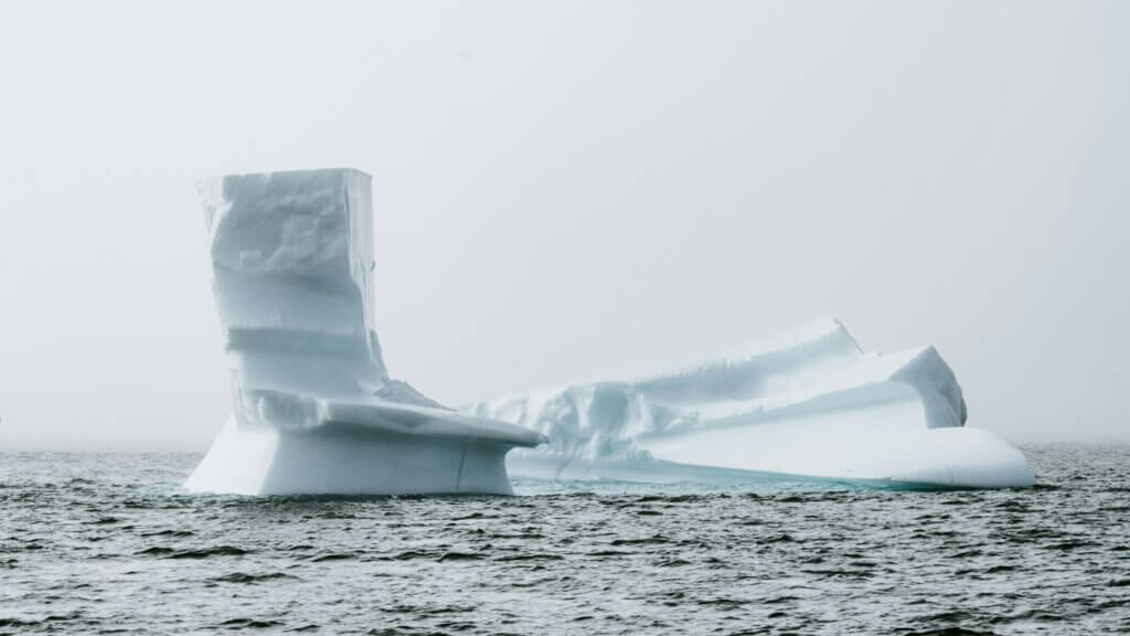 Iceberg surrounded by a body of water in the Arctic